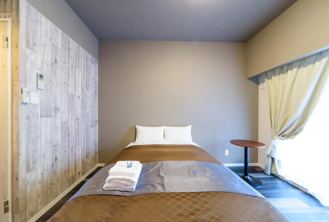 Aparthotel Mr. Kinjo In Mihara à Naha Extérieur photo