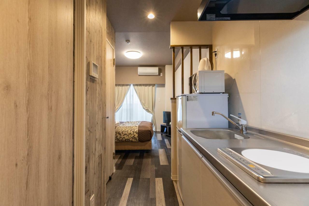 Aparthotel Mr. Kinjo In Mihara à Naha Extérieur photo